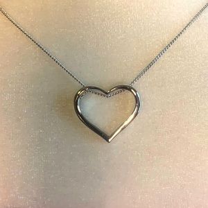 NWT - Silver plated, hollow heart necklace.